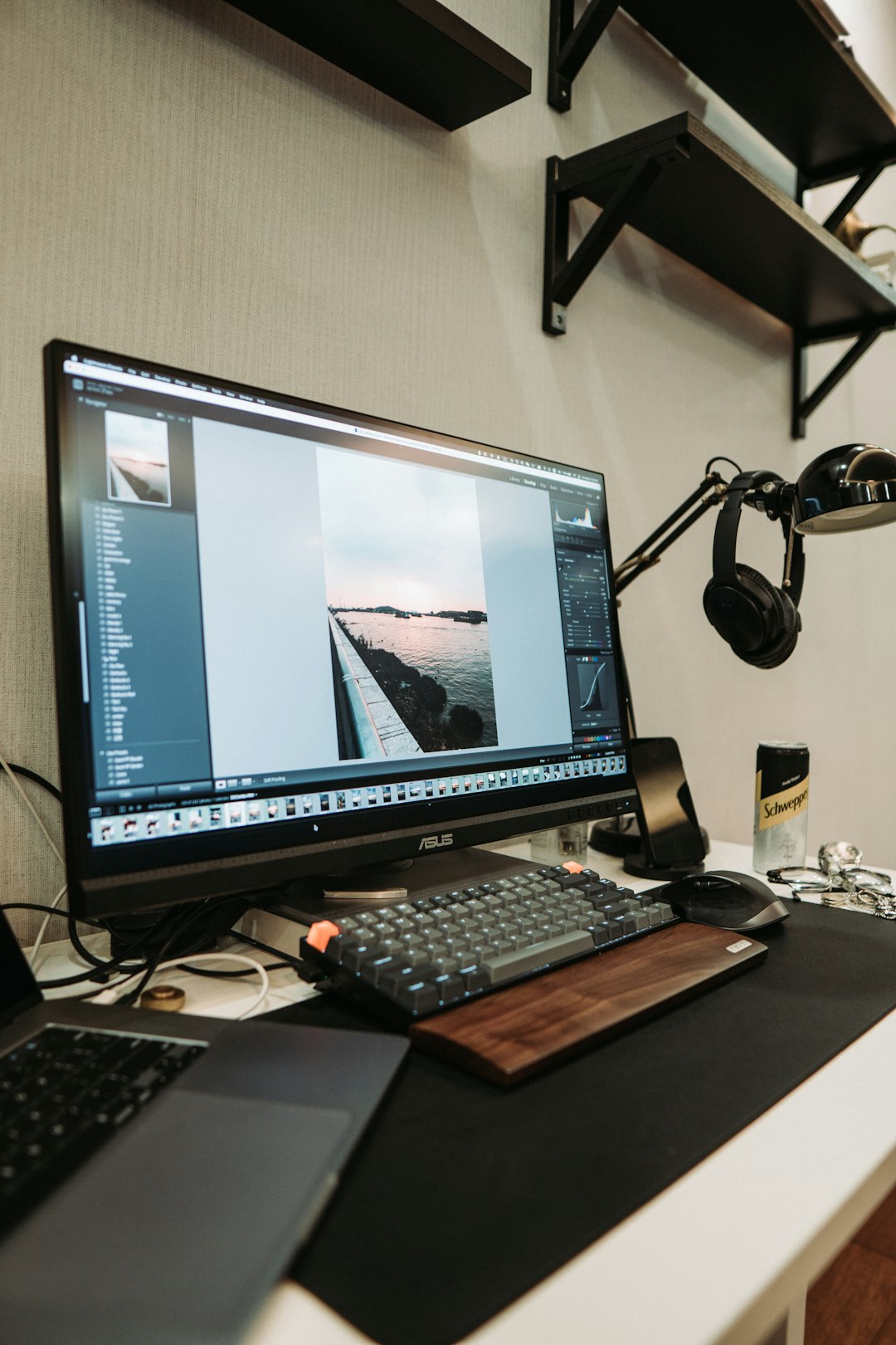 black-flat-screen-computer-monitor-on-brown-wooden-desk-4s8fqur3y-m